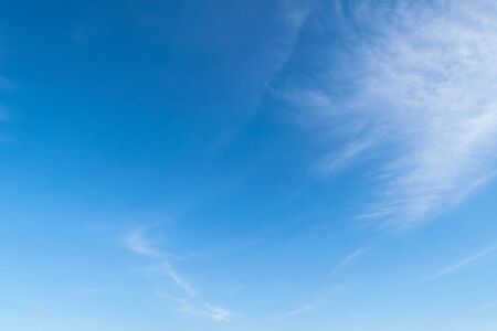 Blue sky with cirrus cloud. It's clearing day and good weather in the morning. It's best time for travelling on holiday.の写真素材