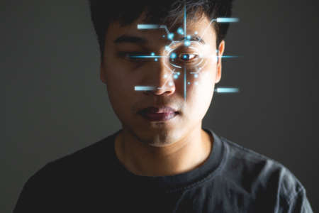 Eye scaning technology in ophthalmology concept. Vision test. Low key photo. Front view.