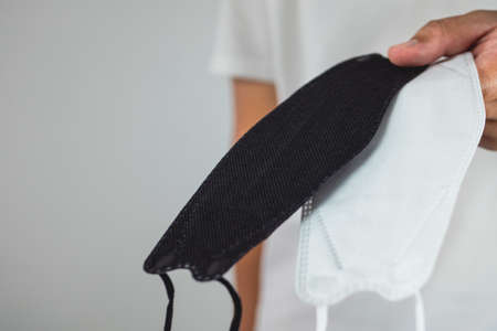 Medical concept. Giving masks to someone for disease protection. Such as influenza, flu, Covid, dust...