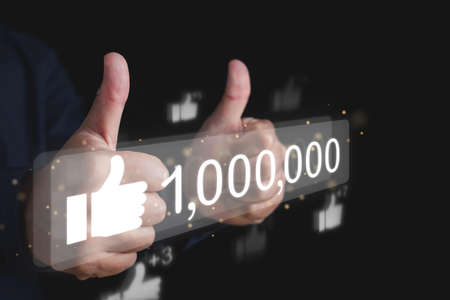 Celebration of 1000000 likes. Thank you all users for following, sharing and subscription. Two hands thumbs up.の写真素材