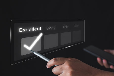 Evaluation and satisfaction concept. Someone chooses a excellent blank with digital pen. Medium close up shot is on black background.の写真素材
