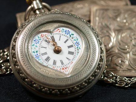 Antique silver watches with painted porcelain faceの写真素材