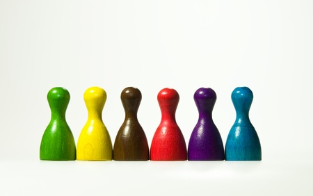 Game pawns in diferent colours in a rowの写真素材