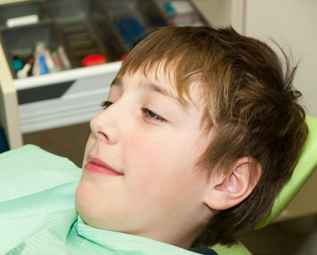 Boy waiting for dental examinationの写真素材