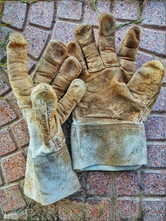 Close up of used work glovesの写真素材