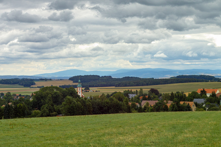 View from the forests to Spitzkunnersdorfの写真素材