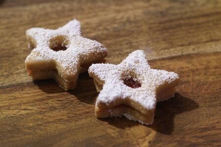 Closeup of Traditional Linzer Cookies on Wooden Boardの写真素材