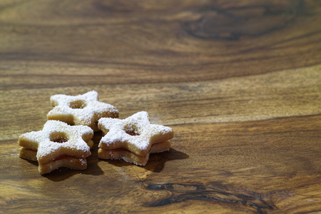 Closeup of Traditional Linzer Cookies on Wooden Boardの写真素材