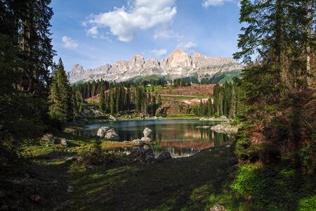 view over the Karersee to the mountain Latemar