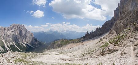 Mugoni's small mountain group Cima Sud (South summit) and Zigolade pass as seen f in the middle of Catinaccio/Rosengarten massif, Dolomites, Sout Tyrol,の写真素材
