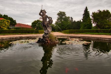 historical wellwith garden and park by the river Ohre in Libochovice in Czechiaの写真素材