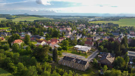 air view of Leutersdorf and the mountains nearby in saxony.の写真素材