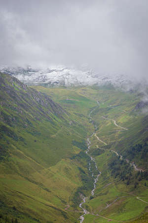 View of snow-covered mountains of a valley of Zillertal - Mayrhofen, Austria (black and white)の写真素材