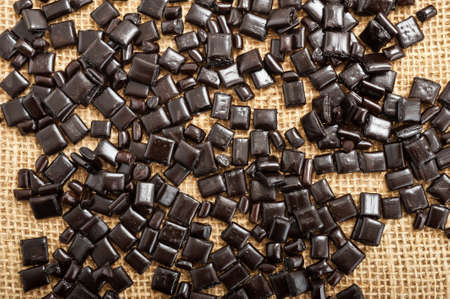 Licorice sweets on the juteの写真素材