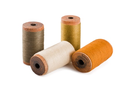 Colored threads wound on bobbins