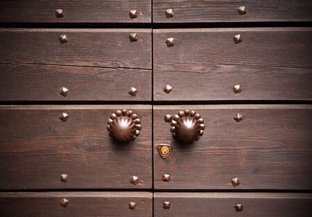 Colsed old wood door with handleの写真素材