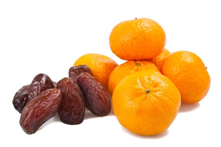 Mandarins with dates isolated on whiteの写真素材