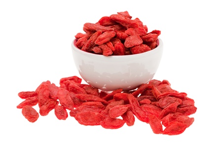 bowl of goji isolated on whiteの写真素材