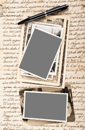 Old pictures on letter backgroundの写真素材