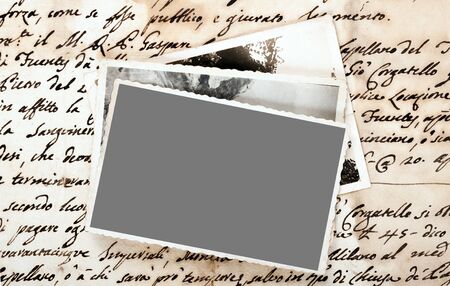 Old pictures on letter backgroundの写真素材