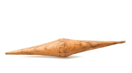 Vintage wooden spindle isolated on whiteの写真素材