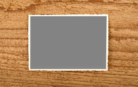 picture frame on wood backgroundの写真素材