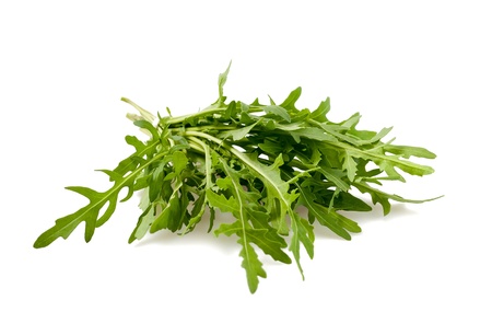 Arugula leaves isolated on whiteの写真素材