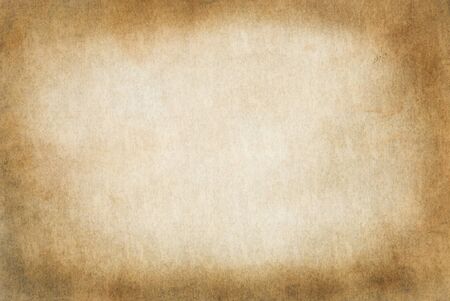 Dirty old parchment isolated on whiteの写真素材