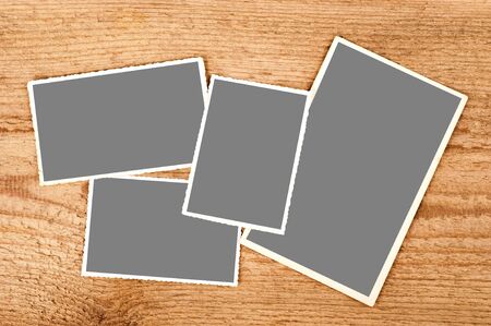 pictures with clipping path on wood backgroundの写真素材