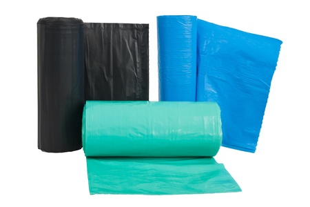 Rolls  of disposable trash bags isolated on white backgroundの写真素材