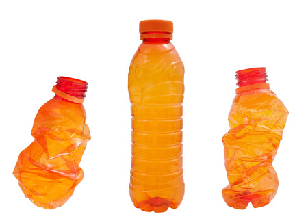 Orange  Plastic bottles isolated on white の写真素材