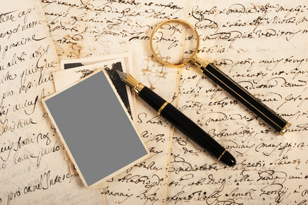 Picture and letters with fountain pen and magnifying glass