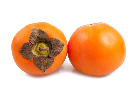 Fresh persimmons or khaki diospyros fruit on white backgroundの写真素材