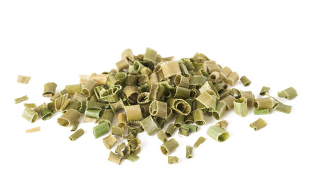 Dried chopped chives isolated on white backgroundの写真素材