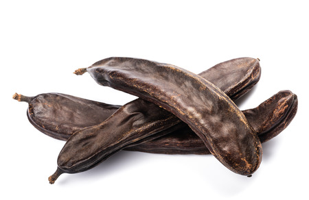 Carob  isolated on white backgroundの写真素材