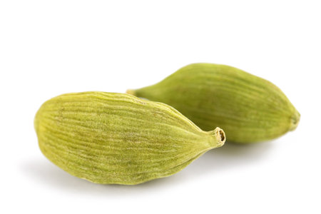 Dried cardamom seeds isolated on white backgroundの写真素材