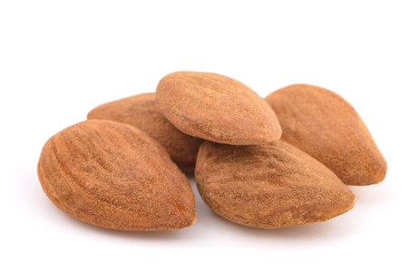 Almond fruits group isolated on white backgroundの写真素材
