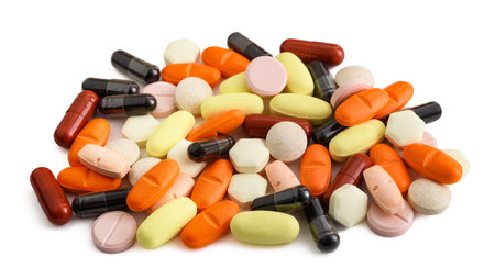 group of various colored medicines isolated on whiteの写真素材