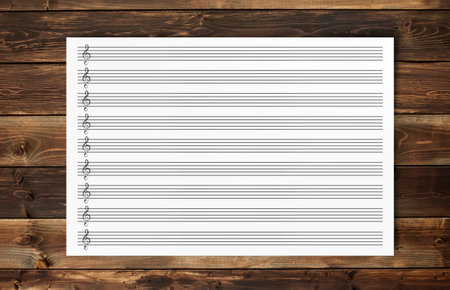 Blank Sheet Music Composition Manuscript Staff  on  wood backgroundの写真素材