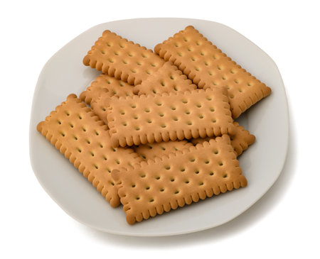 Biscuits group on a plate isolated on whiteの写真素材