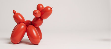 Red balloon animal on transparent background cutoutの素材