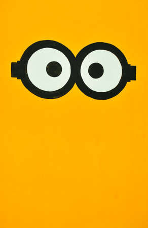 Amber background with both eyesの写真素材