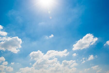 Blue sky with white coulds backgroundの写真素材