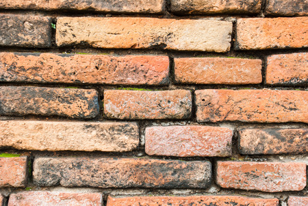 The old red brick wall texture and backgroundの写真素材