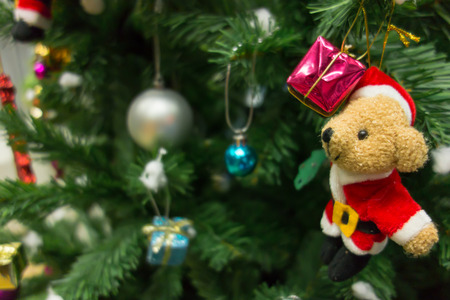 The Christmas tree with Santa doll and gift boxの写真素材