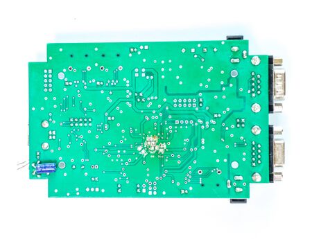 Green PCB circuit with white backgroundの写真素材