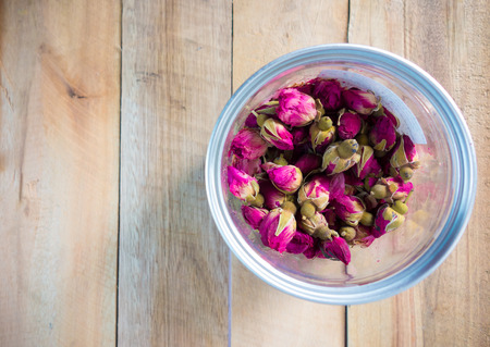 Roses put on the wood floor with copy space,digital effect vintage styleの写真素材