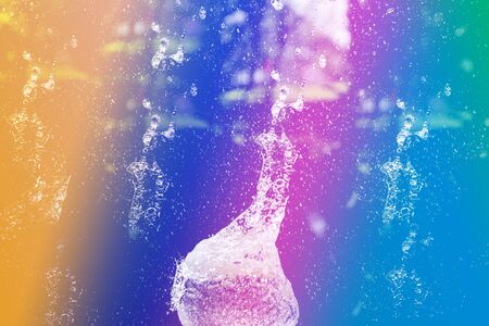 Water splash with colorful style , digital effect abstract for backgroundの写真素材