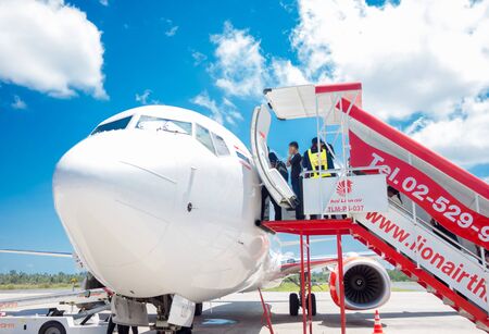 Nakornsrithammarat, THAILAND - MARCH 7 , 2016: HS-DBN Thai Lion Air Boeing 737 loading passengers to carbin. Thai Lion Air company is the low cost airlines in Thailand.のeditorial素材