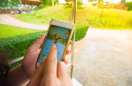BANGKOK, THAILAND - AUG 19, 2016: The hit augmented reality smartphone app Pokemon GO shows a...